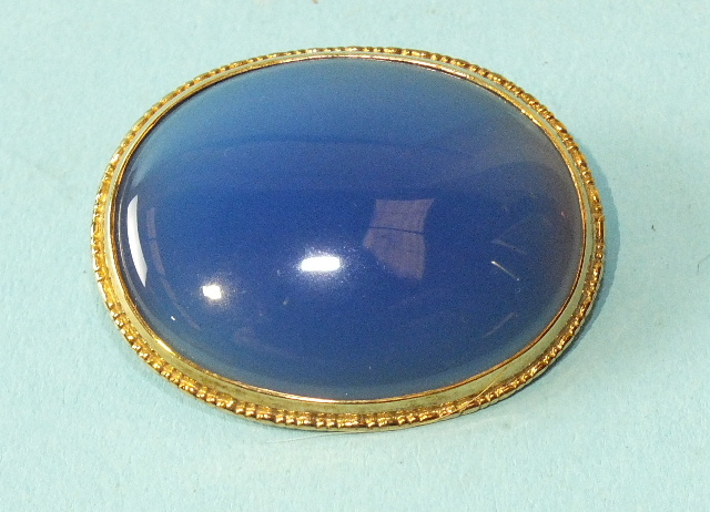 A 9ct gold brooch set oval blue chalcedony, 36 x 28mm, 10.7g.