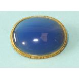 A 9ct gold brooch set oval blue chalcedony, 36 x 28mm, 10.7g.