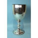 A very large Victorian trophy cup of goblet form, with knopped and beaded stem and base, engraved to