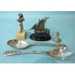 A pair of Continental silver salad servers, marked 800, a small model of a junk and other items.