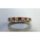 A sapphire and diamond eternity ring alternately-set thirteen each brilliant-cut diamonds and