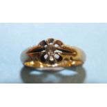 An 18ct gold ring claw-set an old brilliant-cut diamond, size O½, 3.9g.