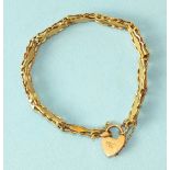 A 9ct rose gold bracelet of fancy links, with padlock clasp, (damaged), 8.6g.
