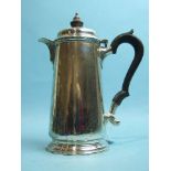 A silver hot water jug of tapered form, 21.5cm high, London 1927___17oz inclusive.