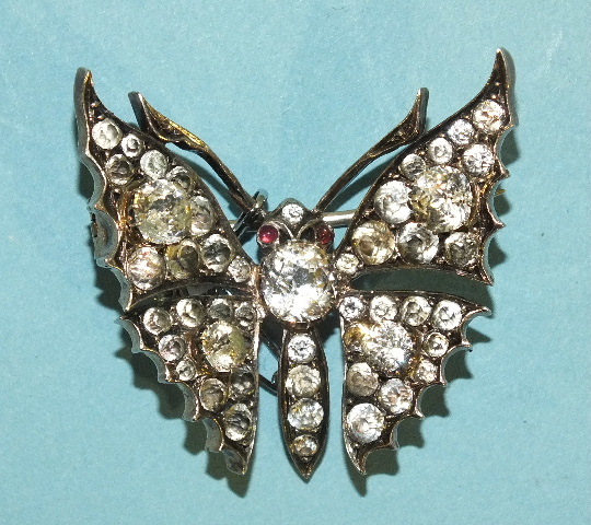 A Victorian silver butterfly brooch set white pastes, unmarked, 4cm.