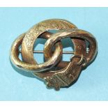 A Victorian engraved gold bolt and buckle brooch, 6.9g, (damaged).