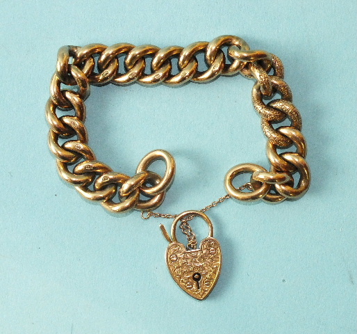 A 9ct rose gold curb-link bracelet with padlock clasp, 30g.