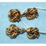 A pair of 18ct yellow gold cufflinks of knot design, 4.9g, cased.