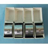 A set of four oval engine-turned napkin rings in boxes, Birmingham 1961, ___7½oz.