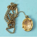 A 9ct gold locket on 9ct gold chain, 9.5g.