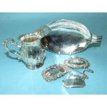 A plain oval sweetmeat dish, 18cm long, London 1943, a cream jug stamped Sterling and three modern