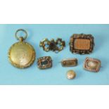 Five mourning brooches, a mourning lapel stud and a plated locket, (7).