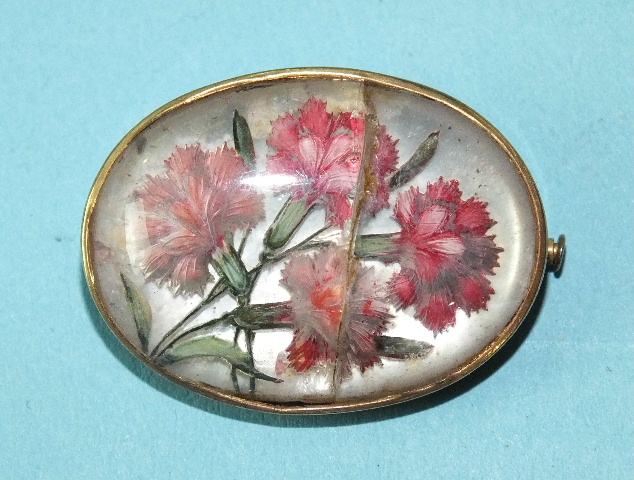 An Essex crystal brooch, pinks, 30 x 23mm, oval, (cracked).