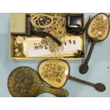 A quantity of costume jewellery and watches, two dressing table mirrors and a brush.