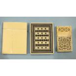 A 19th century small ivory card case (slight damage), a Vizagapatam card case and a plain ivory card