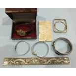 Four silver bangles, 67g, a child's plated bangle, two Chinese metal plaques and a gent's Rotary