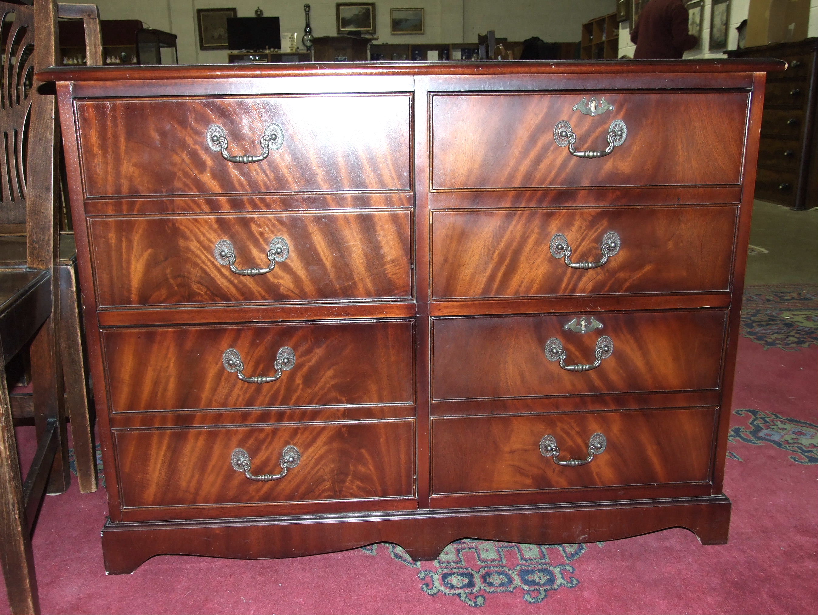 A modern mahogany four-drawer filing chest with inset leather top, 103 x 77cm. a 20th century