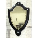 A painted wooden-framed shield-shaped mirror, 90 x 79cm, two oval framed wall mirrors and others.