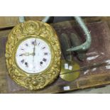 A 19th century French wall clock with enamelled convex dial and brass bob pendulum, striking on a