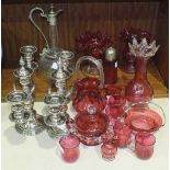 A collection of cranberry glassware, a pair of modern silver-plated short candelabra, 26cm high,