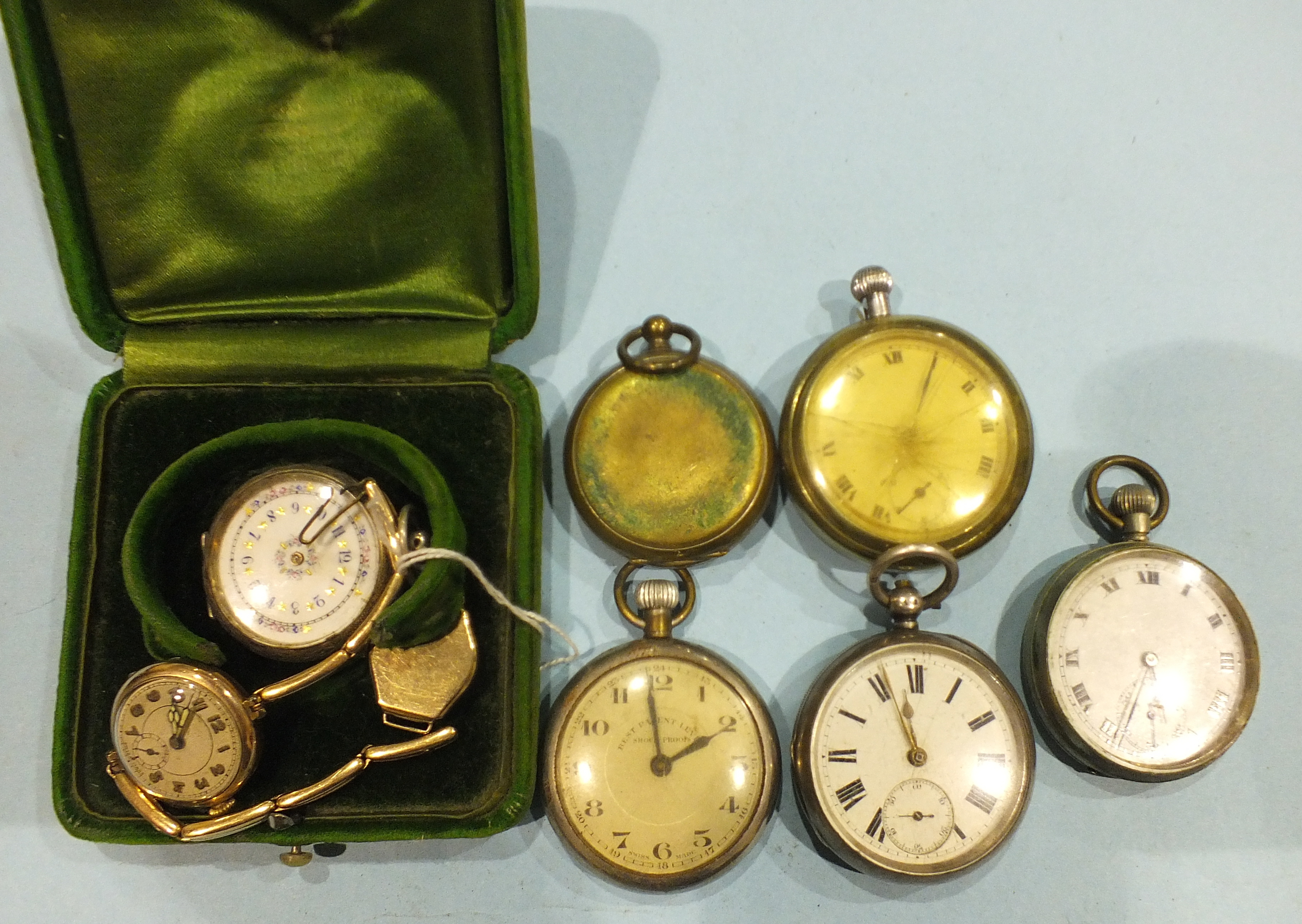 A lady's 9ct gold cased wristwatch, a gold-plated wristwatch, boxed and a lady's Continental