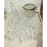 A large moulded glass champagne bucket, various cut-glass wine glasses and other glassware.