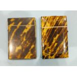 Two tortoiseshell-covered card cases.