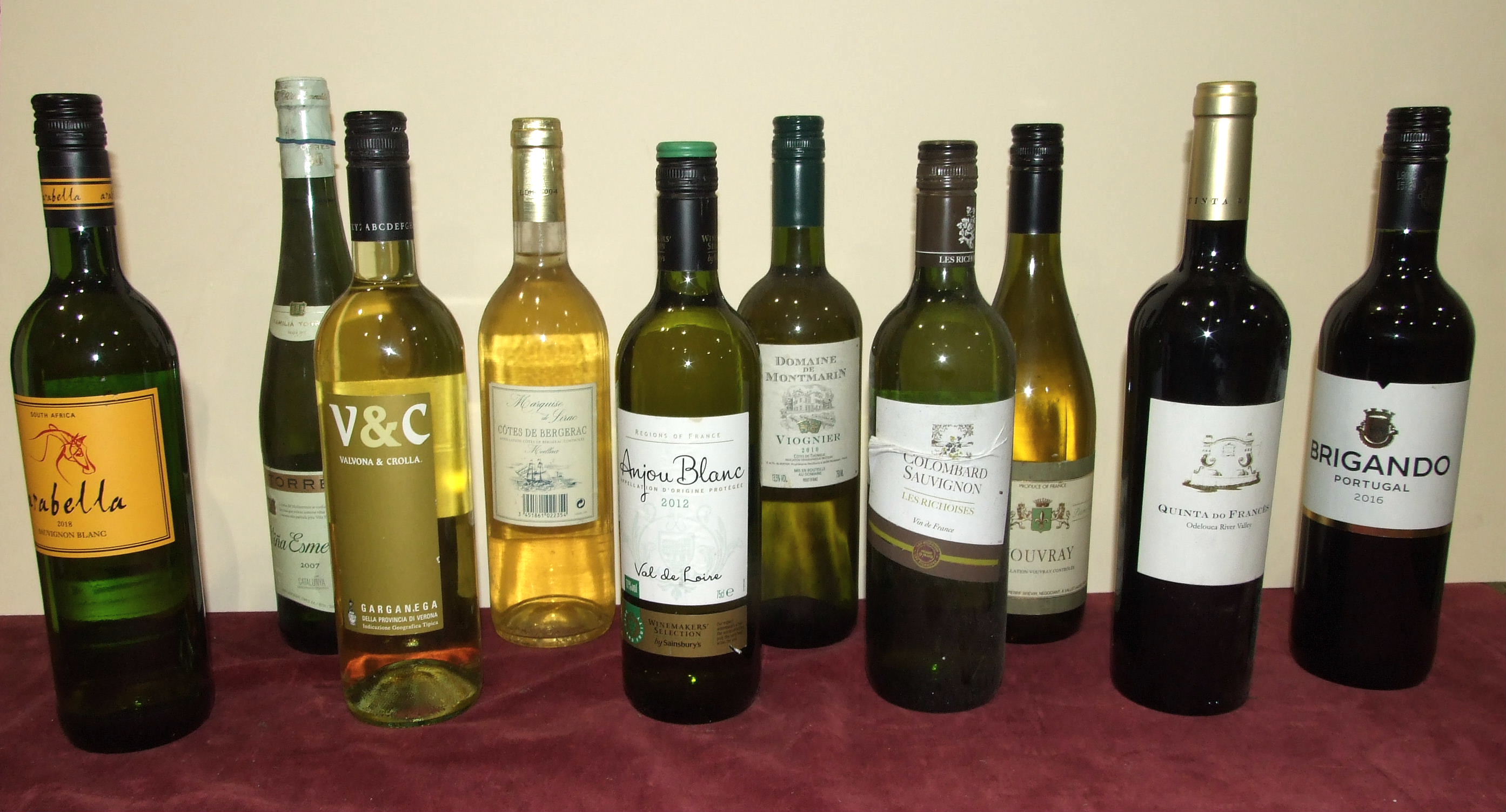 A collection of mixed wines, nine white and two red, (11).