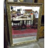 A large reproduction gilt frame wall mirror, 110 x 142cm.