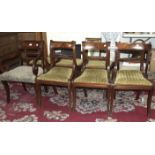 A set of eight Regency-style mahogany dining chairs with drop-in seats and rope-twist backs, on
