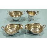 A pair of Georgian style silver sauce boats, 15cm long, Sheffield 1933, maker EV, a matching cream