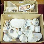 A collection of dolls' teaware and other items.