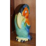 A 1920's-30's Goebel spill vase in the form of a brightly-coloured stylised toucan, 17.5cm high,