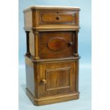 A 19th century French rosewood pot cupboard fitted with a drawer and two cupboard doors, 42cm wide