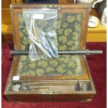 A brass-bound walnut writing slope, 35.5cm and contents, including a Parker Duofold fountain pen,