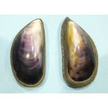 A silver-plated snuff box inset a mussel shell and a similar brass mounted example, (cracks to