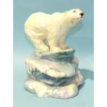 A 20th century ceramic sculpture of a polar bear standing on an ice floe, monogram and impressed R