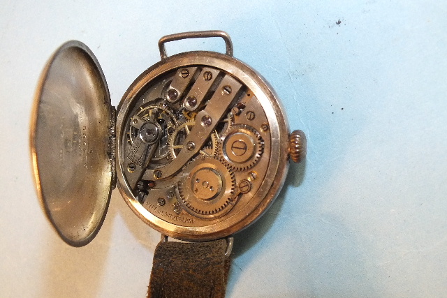 A Continental trench-type wrist watch, the white face with Arabic numerals and seconds subsidiary, - Image 2 of 3