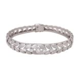 Armband besetzt mit 9 Brillanten, zus. ca. 0,75 ct,WEISS - LGW (H - I) / VS, WG 18K, L: ca. 17,5 cm,