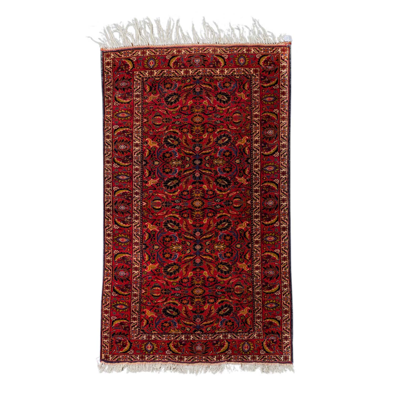 Orientteppich. GHASEMABAD/IRAN, 20. Jh., ca. 184x108 cm.Der rote Fond des Innenfeldes und die