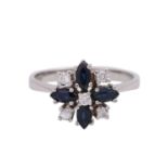 Ring mit 4 Saphirnavettes, zus. ca. 0,86 ct und 5 Brillanten,zus. ca. 0,2 ct, (beides punz.) gefasst