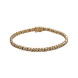 WEMPE Rivièrearmband ausgefasst mit 63 Brillanten, zus. ca. 1,2 ct,FW-WEISS (F-H)/VS-SI, GG 18K,