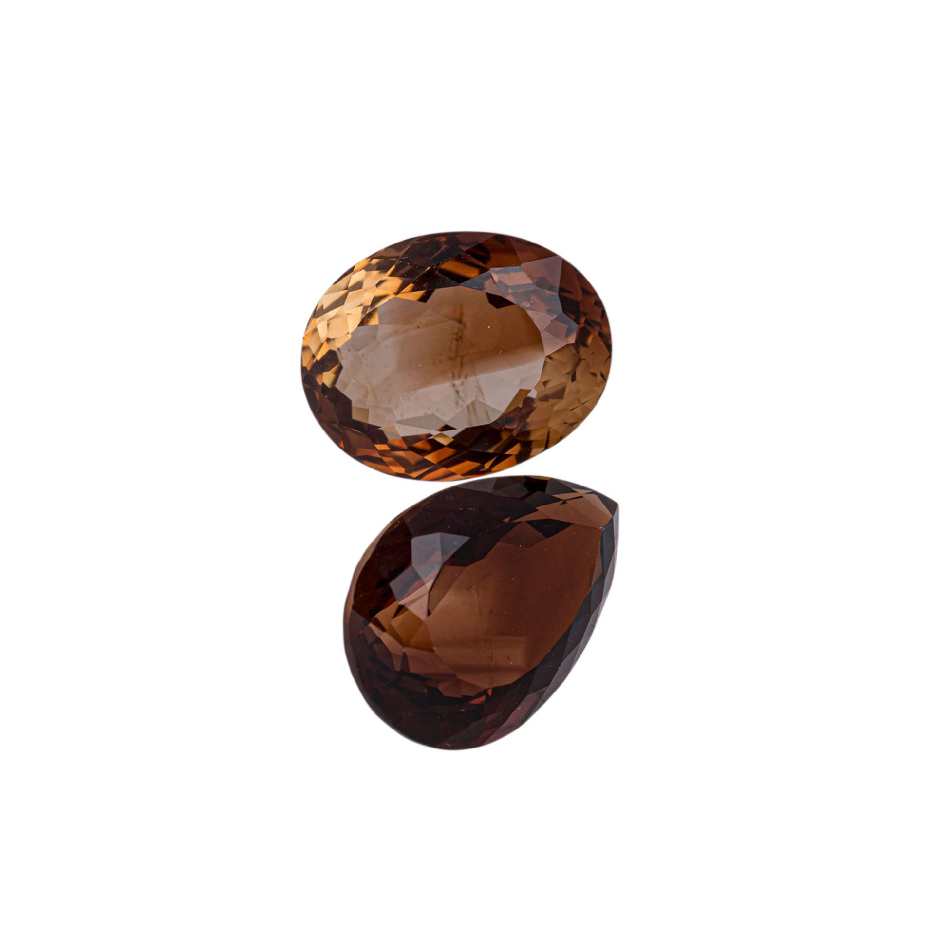 Natürlicher Topas, 26,89 ct. (13,24 + 13,65 ct.),Tropfen und Oval, facetiert, 18 x 12.5 x 8 + 16 x