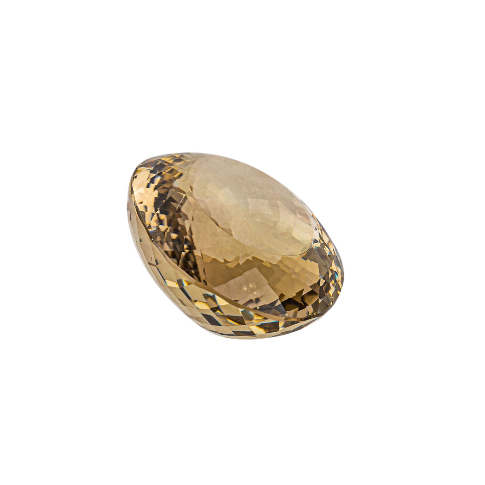 Loser Citrin, ca. 190 ct.,43 x 34 x 19 mm, leicht bestossen. Oval Schliffvariation.Losse Citrine, - Bild 3 aus 4