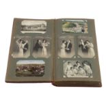 Postkarten - Album mit knapp 500 Karten,wohl überwiegend aus 1900/20, dabei viele Ansichten aus