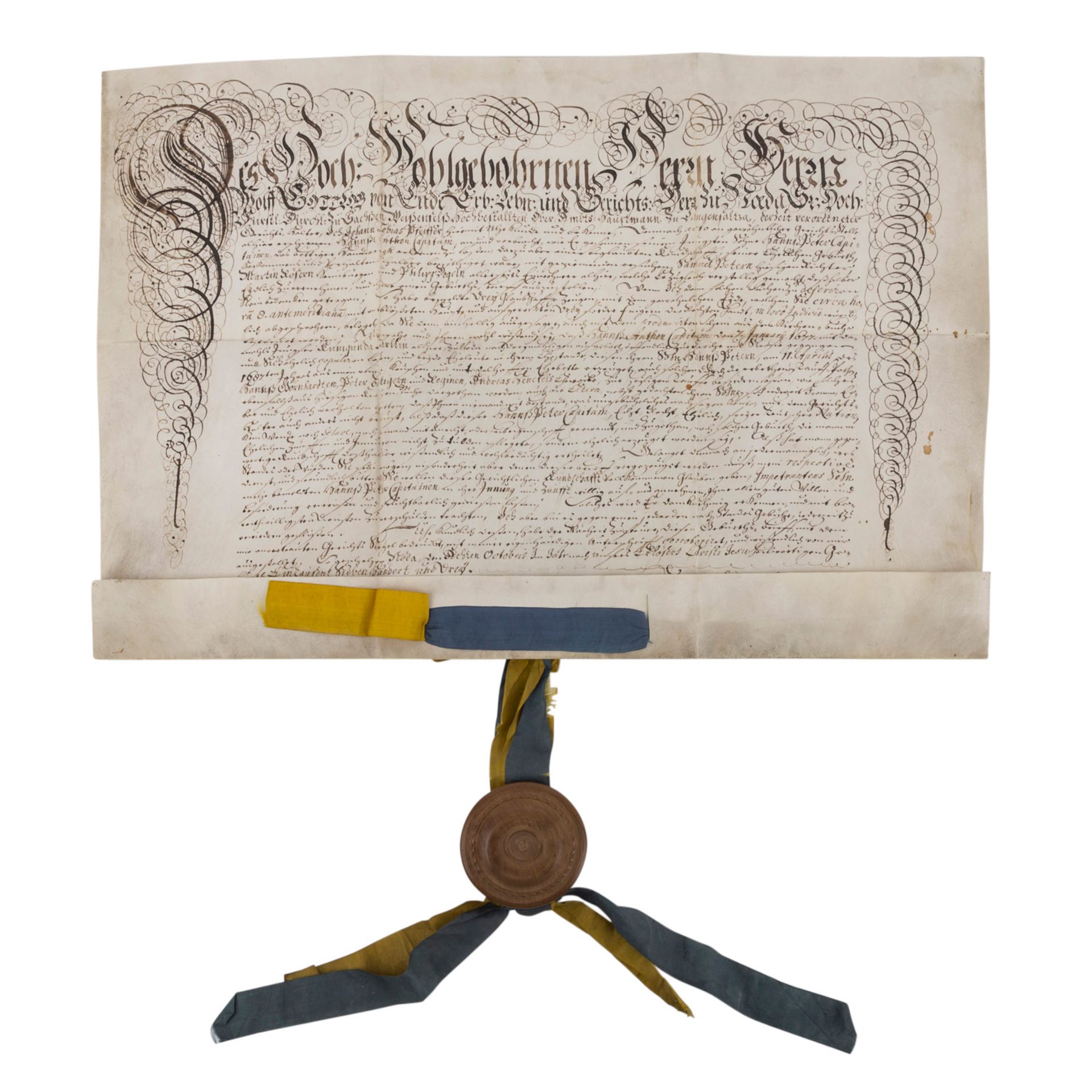 Urkunde von 1703 mit Obstbaumholz-Siegelkapselmit blau-gelben Bändern verziert (Farben Sachsen