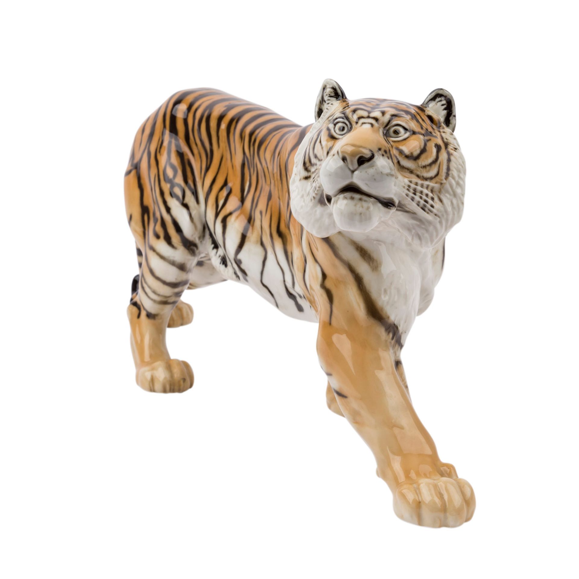 HUTSCHENREUTHER 'Schreitender Tiger', Marke nach 1982.Weißporzellan polychrom gefaßt, L. ca. 57cm.