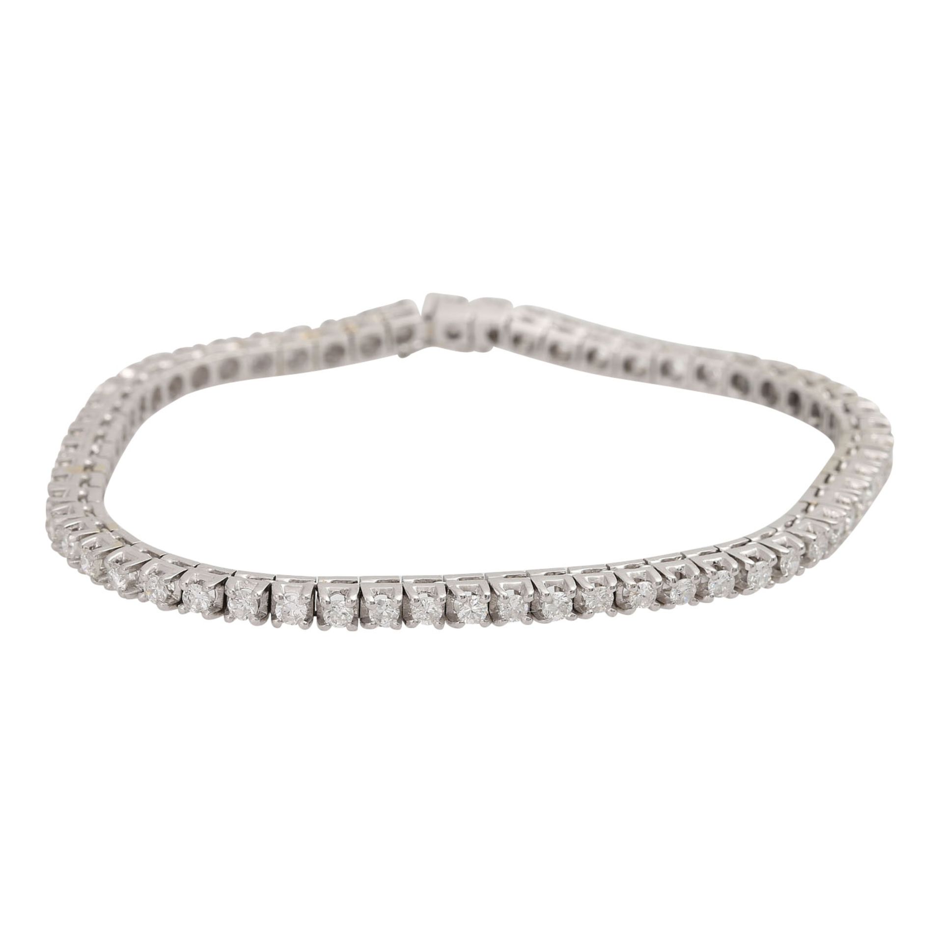 Rivièrearmband mit 58 Brillanten, zus. ca. 2,9 ct,LGW (J)/SI, tlw. mit Naturals, WG 18K, L: ca. 18