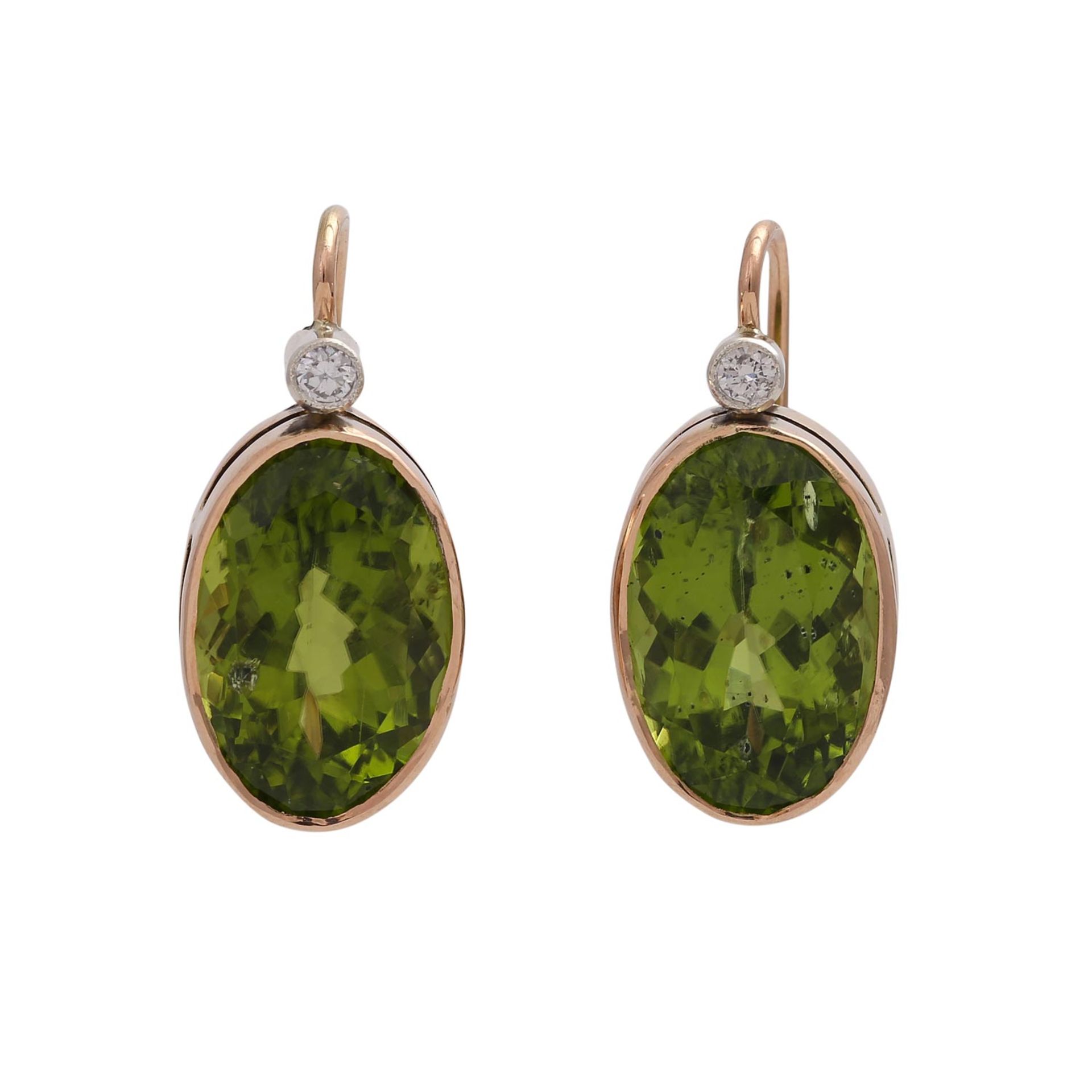 Ohrringe mit je 1 Brillant, zus. ca. 0,1 ct und Peridot,oval fac., ca. 14x9 mm, RSG 14K / Silber, L: