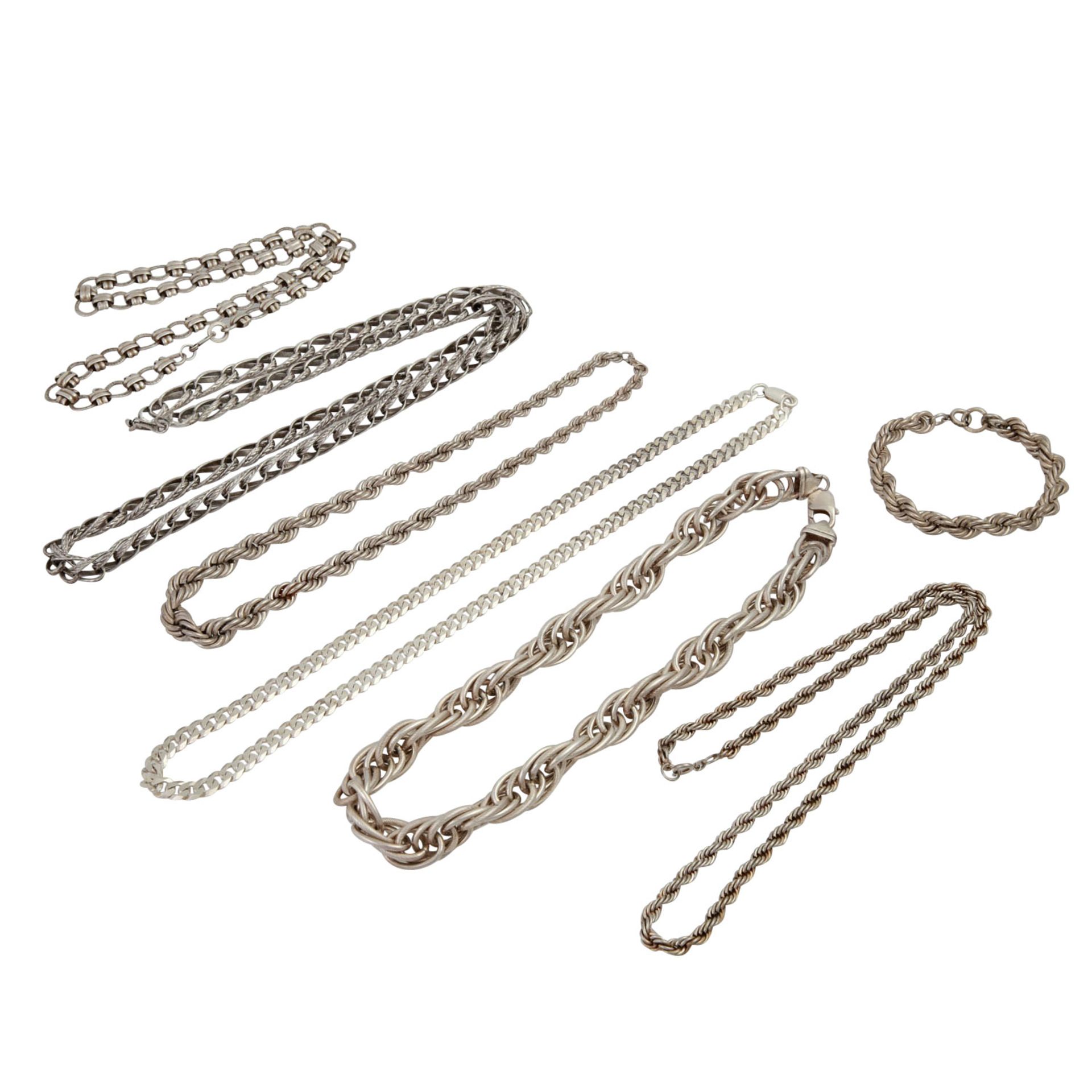 Schmuckkonvolut Silber, 7-teilig,best. aus 6 Ketten, 1 Armband, mit Tragespuren.Bundle of silver